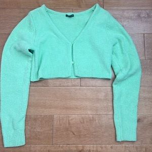 It is a subtle neon green cardigan, medium from wild fable